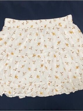 Forever 21 White Mini Skirt with Gold Floral Print